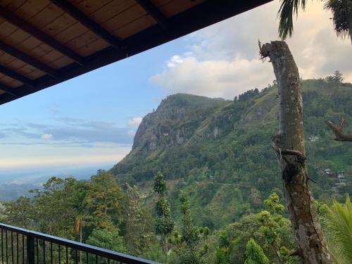 a view of a mountain from a balcony at Country Homes in Ella