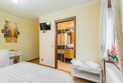 Una cama o camas en una habitación de Mandoué