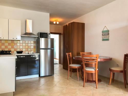 Kuchyň nebo kuchyňský kout v ubytování MR. HALL Apartments