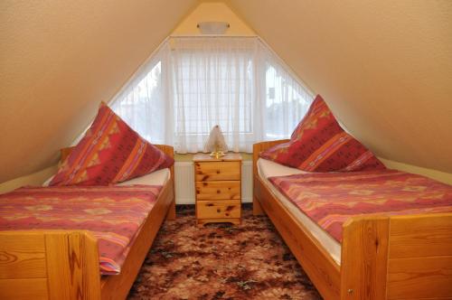 Säng eller sängar i ett rum på Ferienhaus Neubert
