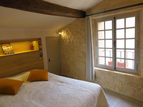 Postel nebo postele na pokoji v ubytování La Taverne de l'Escuelle