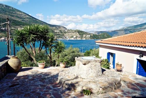 a house with a view of the water at Villa Marika in Vathi, Ithaka