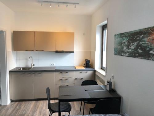 Kuchyň nebo kuchyňský kout v ubytování Ferienwohnung "An der Stadtmauer"