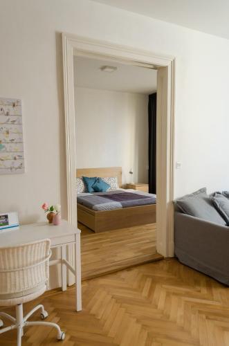 Katil atau katil-katil dalam bilik di Oltec Apartment Brno