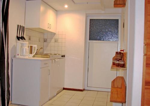 Η κουζίνα ή μικρή κουζίνα στο Ferien auf Hiddensee _ Neuendorf