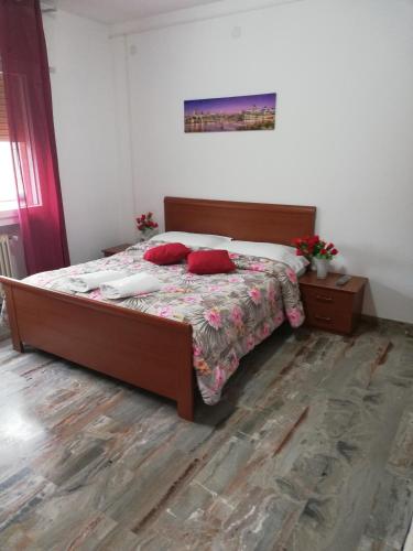 Ένα ή περισσότερα κρεβάτια σε δωμάτιο στο Venice Holiday