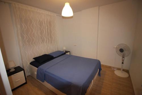 A bed or beds in a room at New apartment near center/beach
