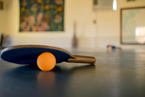 a ping pong paddle on top of a table at Hotel Porto do Zimbo in Morro de São Paulo
