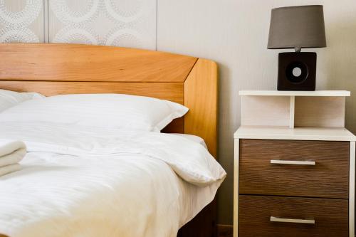 Ένα ή περισσότερα κρεβάτια σε δωμάτιο στο Di Angolo Apartments