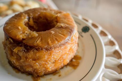a doughnut sitting on a plate on a table at Hotel Porto do Zimbo in Morro de São Paulo