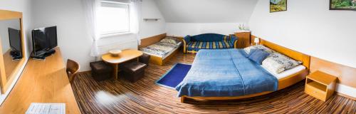 Postel nebo postele na pokoji v ubytování Penzión Marco Polo