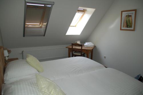 Ένα ή περισσότερα κρεβάτια σε δωμάτιο στο Bed & Breakfast Appeltern