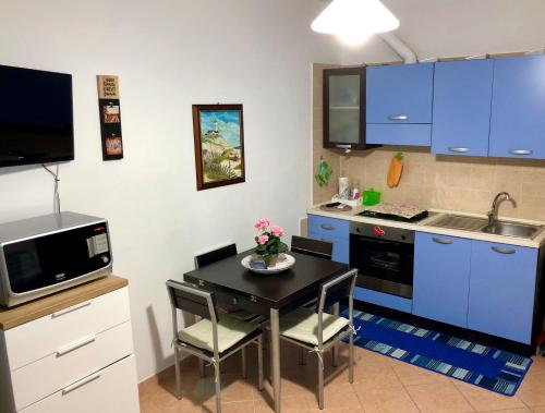 Kuchyň nebo kuchyňský kout v ubytování "casa le Palme"