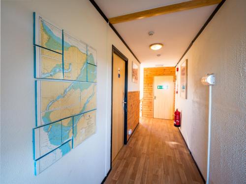 a hallway with a map on the wall at Anglesey Outdoors in Holyhead