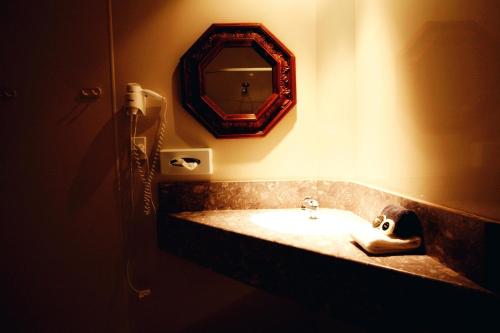 Ванна кімната в Woodlyn Park Motel