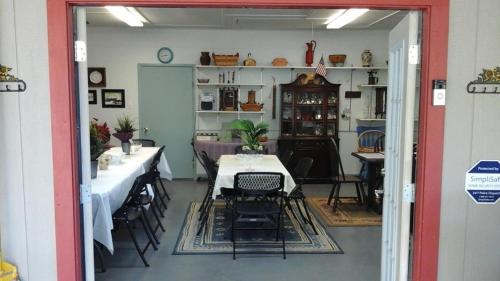 a dining room with a table and chairs at Kelumac Christmas Tree Farm B&B in Bryan