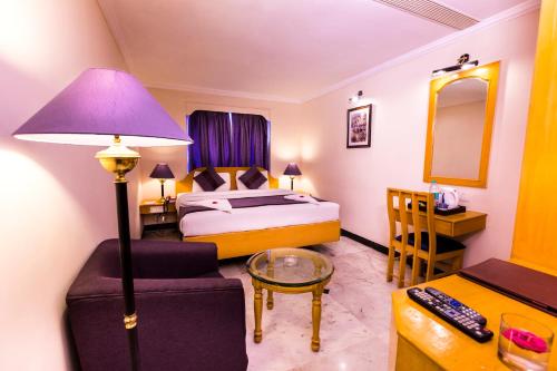 Postel nebo postele na pokoji v ubytování Hotel Grand Residence