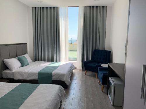 Postel nebo postele na pokoji v ubytování Home Thiên Trang 3