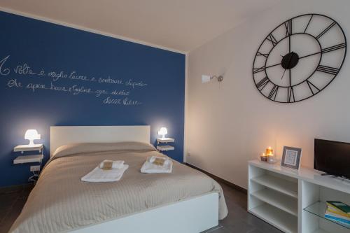 Cama o camas de una habitación en AFFITTACAMERE VIA DEI MILLE