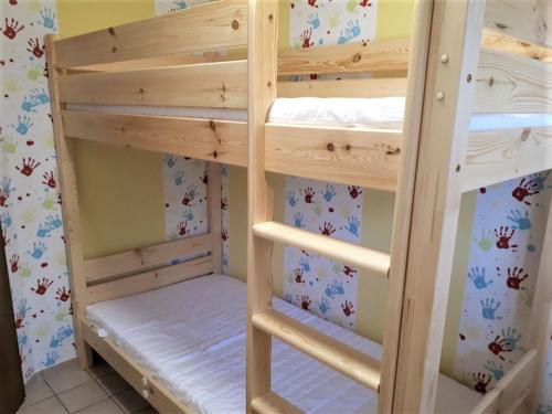 a couple of bunk beds in a room at Ferienwohnung Bender in Sinsheim