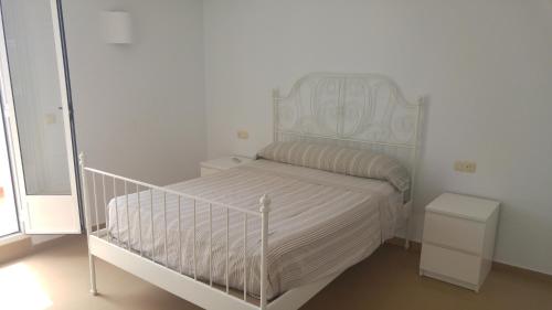 Кровать или кровати в номере Casa Chafarinas
