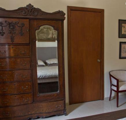 Un pat sau paturi într-o cameră la Casa Madonna