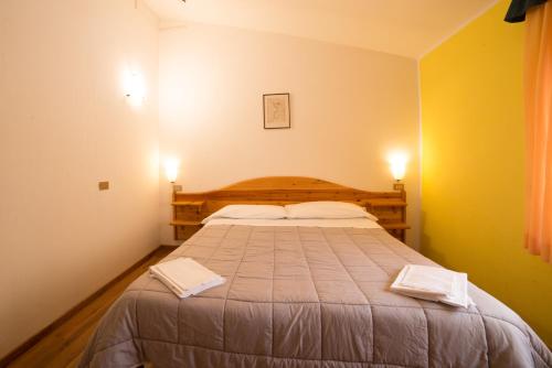 Ένα ή περισσότερα κρεβάτια σε δωμάτιο στο Hotel Appennino