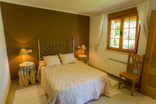 מיטה או מיטות בחדר ב-Suit Brais