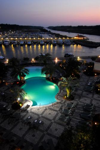 a swimming pool in a marina at night at Marina Inn at Grande Dunes in Myrtle Beach