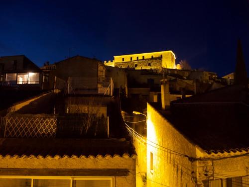 a view of a city at night with buildings at Verdon Secret - L'escapade parfaite in Gréoux-les-Bains