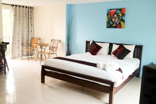 מיטה או מיטות בחדר ב-Spa Guest House