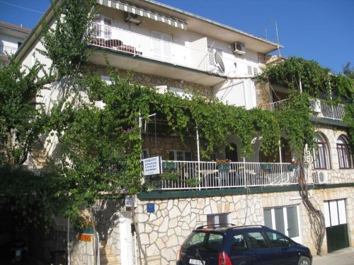 a car parked in front of a building at Villa Volga in Jelsa