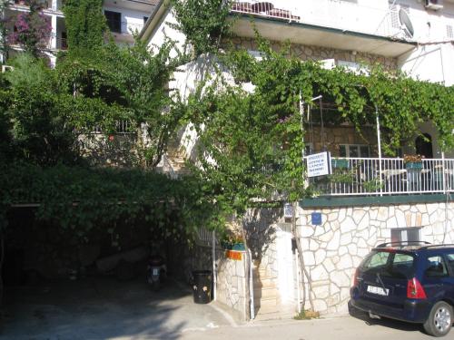 a car parked in front of a building at Villa Volga in Jelsa