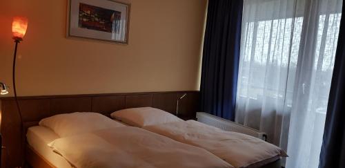 Hotel Garni Juliaにあるベッド