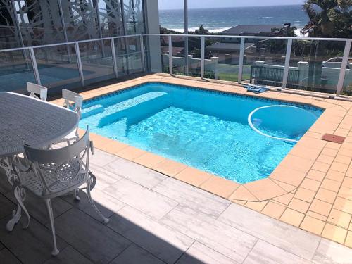 a swimming pool on top of a building at 88 on Svea in Margate