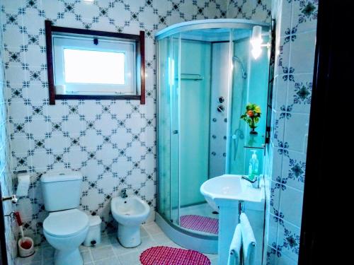 Koupelna v ubytování Casa Vale do Rio Ovil