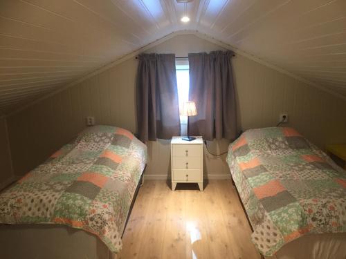 Кровать или кровати в номере Frydenlund