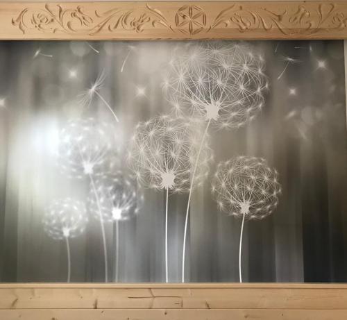 a painting of dandelions in front at Apartament w Jaworkach - Pod Wysoką in Jaworki