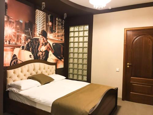Кровать или кровати в номере Отель Бон Ами