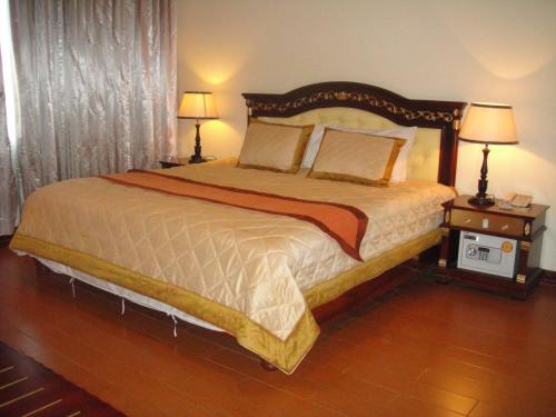 Katil atau katil-katil dalam bilik di Stung Sangke Hotel