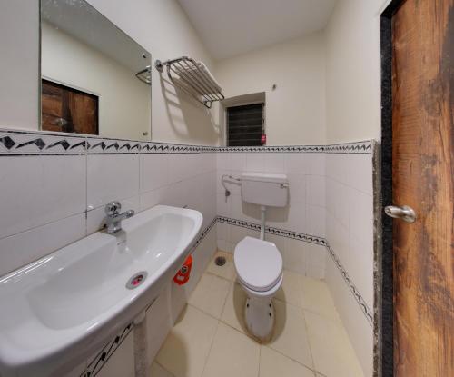 Phòng tắm tại Hotel Parag Deluxe Kolhapur