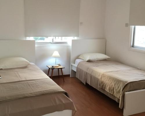 Postel nebo postele na pokoji v ubytování RESIDENCE ONE