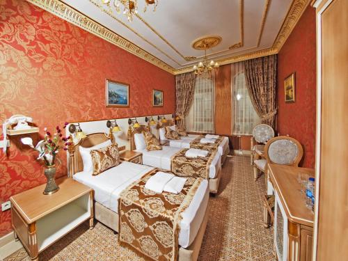 Postel nebo postele na pokoji v ubytování Glamour Classic Hotel Istanbul Sirkeci