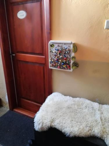 a room with a door and a rug next to a door at Apartmán Alice in Jablonec nad Jizerou
