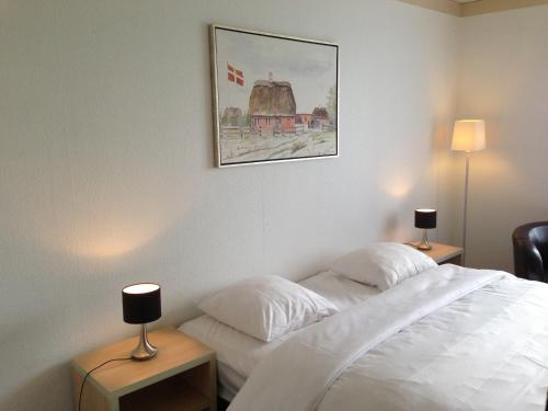Postel nebo postele na pokoji v ubytování Hotel Vadehavet