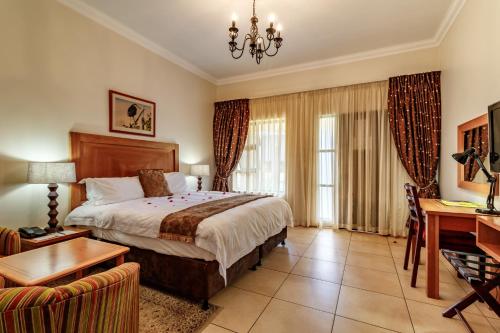 Ένα ή περισσότερα κρεβάτια σε δωμάτιο στο Hoyohoyo Chartwell Lodge