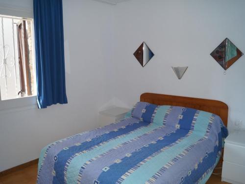 En eller flere senge i et værelse på Levantina 10
