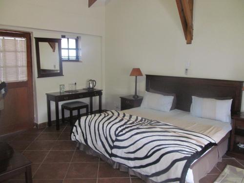 Katil atau katil-katil dalam bilik di The Woodsman Bed and Breakfast
