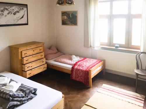 Posteľ alebo postele v izbe v ubytovaní Nízke Tatry- Horná Lehota
