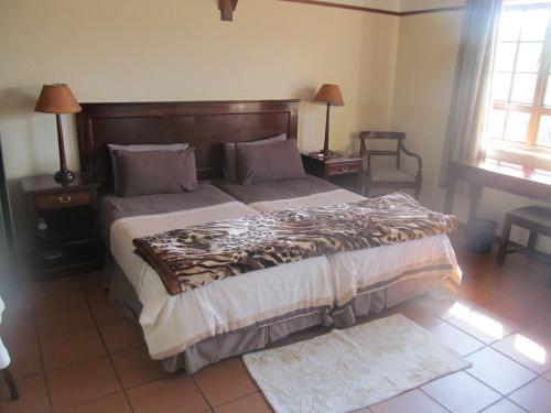 Katil atau katil-katil dalam bilik di The Woodsman Bed and Breakfast